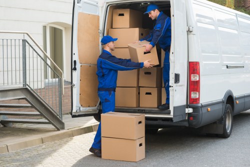 Packed boxes and furniture ready for a flat removal in West Hampstead