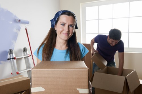 Moving van and packed boxes representing the booking and service process