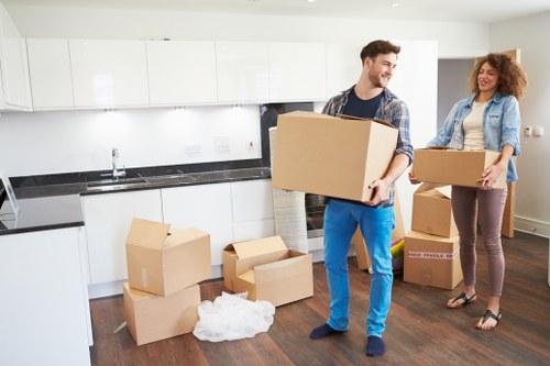 Van service loading furniture for a West Hampstead household move