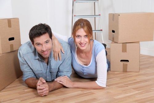 Home move planning in West Hampstead with packed boxes and local street view