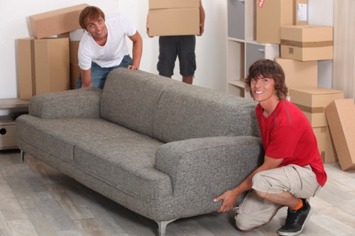 Unloading furniture and boxes into a new Westhampstead apartment