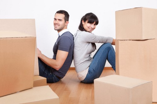 Professional movers carrying student furniture in Westhampstead