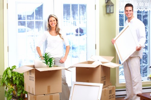 Movers planning a busy West Hampstead relocation near station roads and limited parking