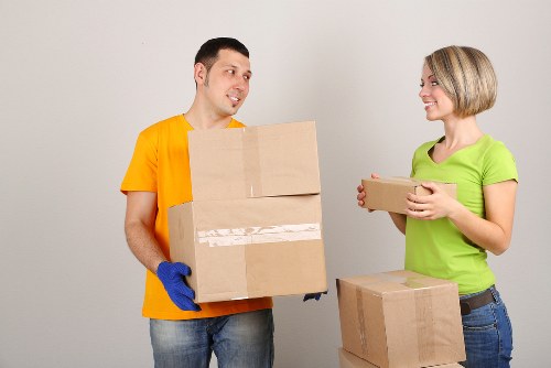 Apartment relocation scene showing boxes and moving van in West Hampstead