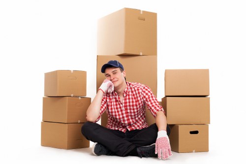 Careful packing for a West Hampstead house relocation with labeled moving boxes
