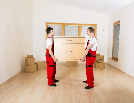 Specialist piano removals service positioning a grand piano in a West Hampstead home